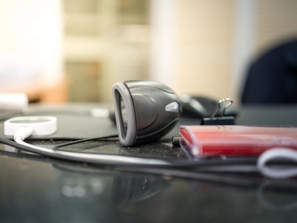 daily office workspace with small digital gadgets placed on desk